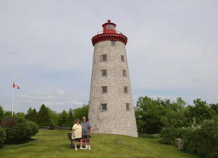 Us at Windmill Point Lighthouse in Ontario, Canada